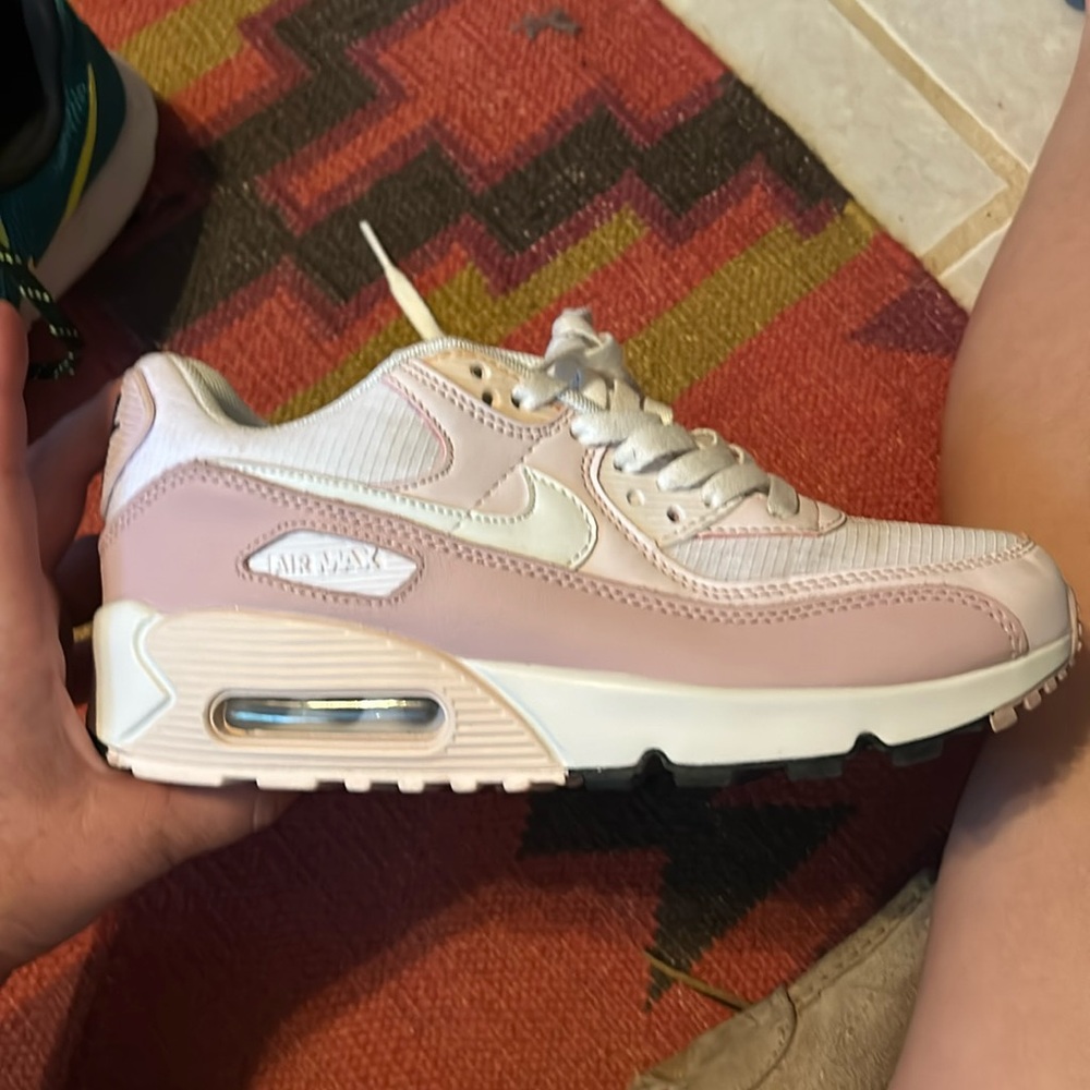 Nike AirMax women’s athletic shoes. Size 8.Worn once. Light dirt marks on toes.